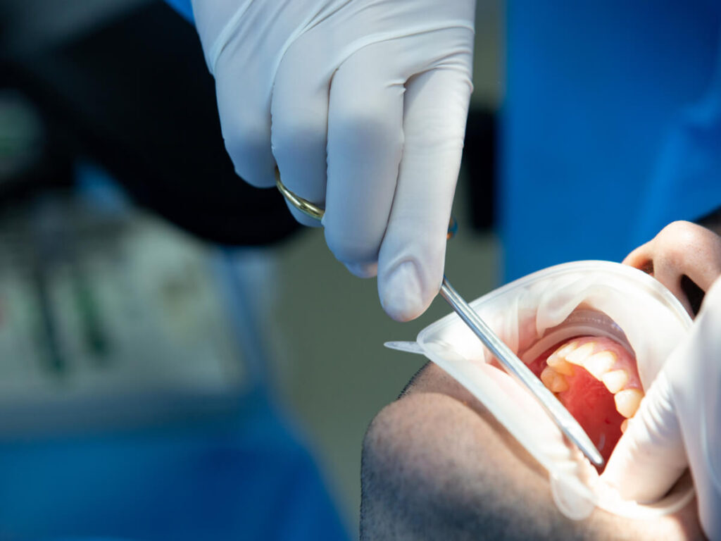 dentists conducting dental surgery
