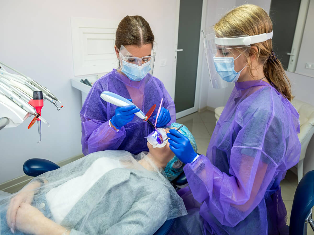 dentists conducting oral and maxillofacial surgeons